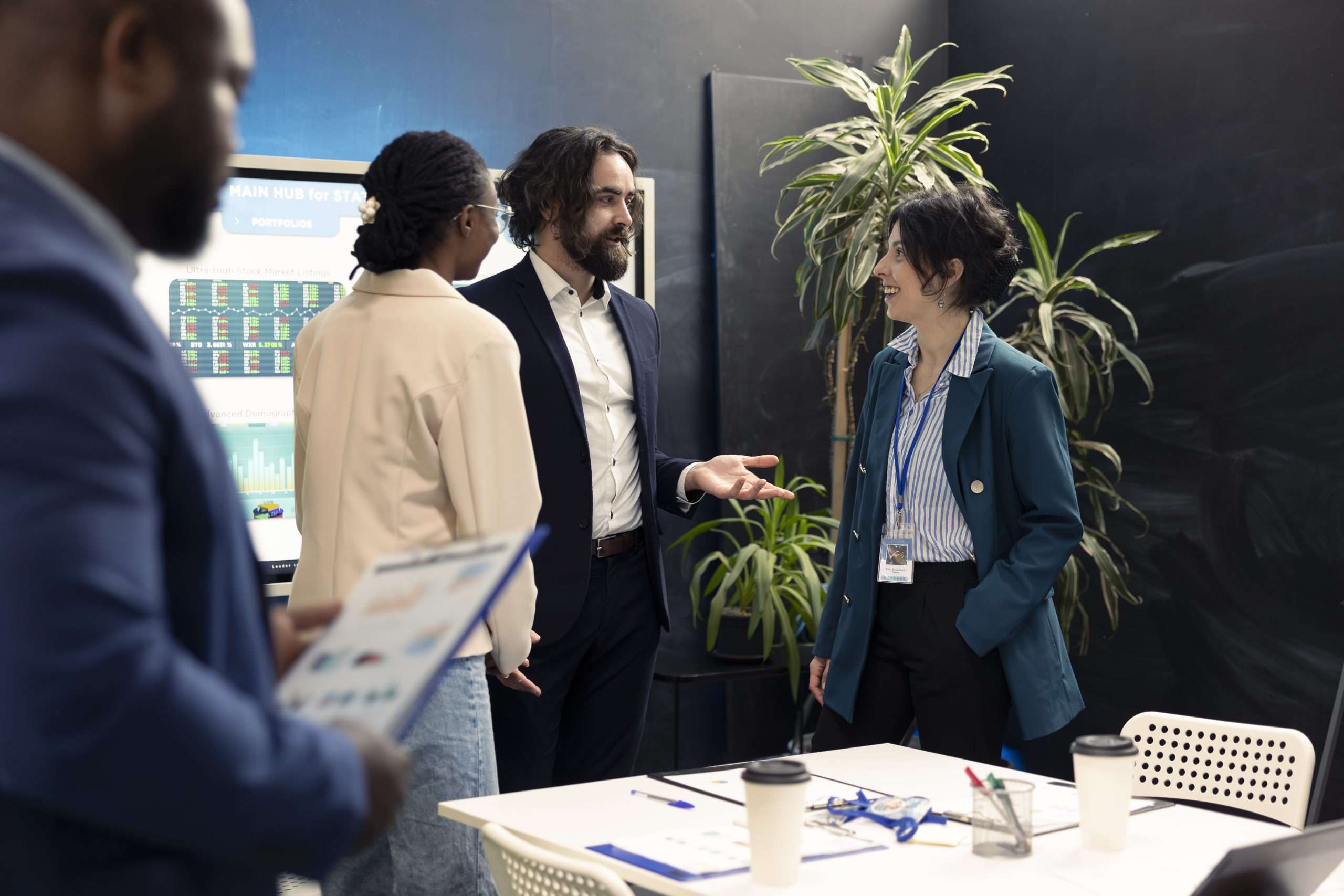 Crew of staff members assembling in an overview conference